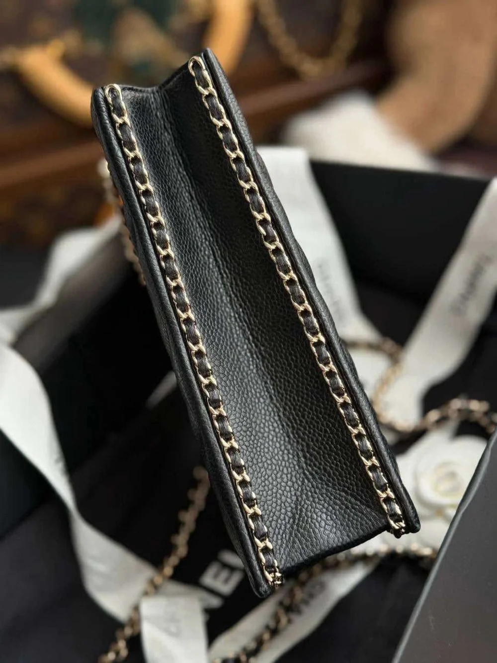 CHANEL Black Quilted Leather Phone Pouch with Gold-Tone CC
